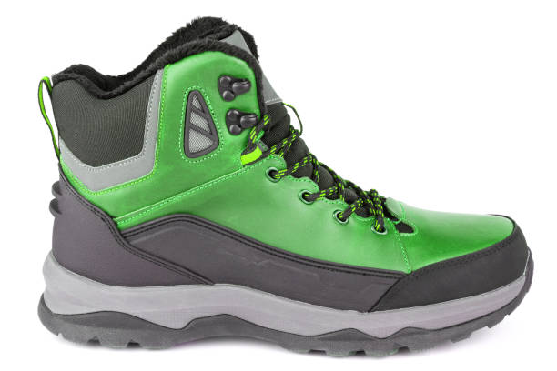 istock green insulated winter warm three quarter sneaker or boot isolated on white background 1301441210
