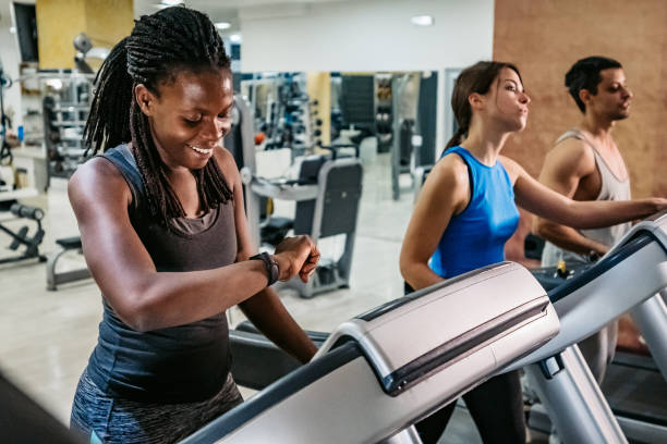 istock People running on treadmill in gym 1301442424