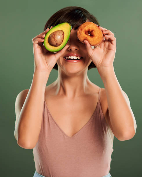 istock Donut give in to unhealthy cravings 1301442483