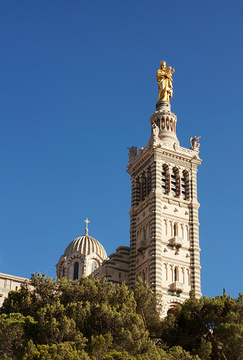 Notre-Dame de la Garde/ literally Our Lady of the Guard is a basilica in Marseille, France.