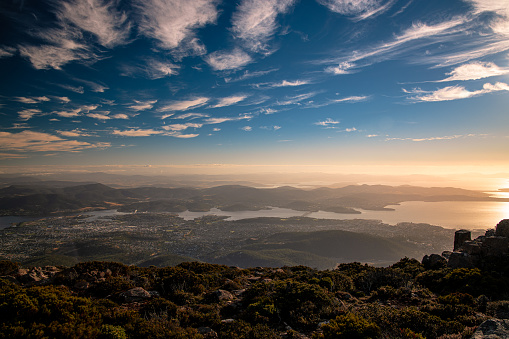 Hobart, Australia - February 1, 2021: The early morning sun shining over the Tasmanian capital of Hobart as seen from the highest point in the city, Mount Wellington.