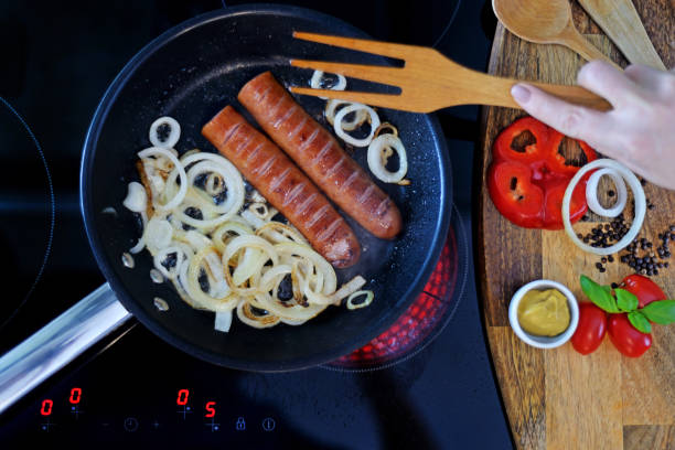 Frying Pan With Sausage And Onion.
