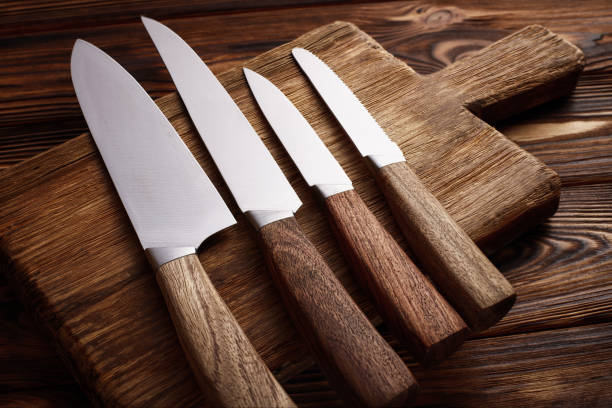 istock A variety of kitchen knives on a cutting board 1301456185