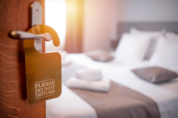 istock Hotel room door open 1301456725