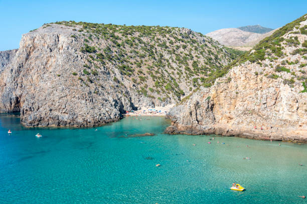 istock crystal clear and tropical water at Cala Domestica beach 1301457665