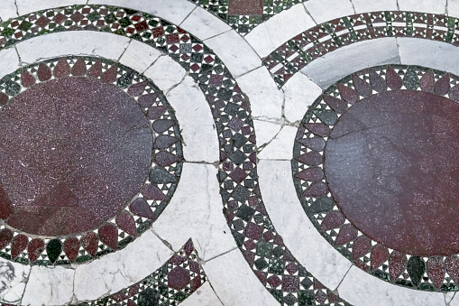 Rome, Italy – October 15,.2020: Floor in the Cosmata technique with geometric patterns in polychrome marble in the Church of St. Mary Maggiore in Rome