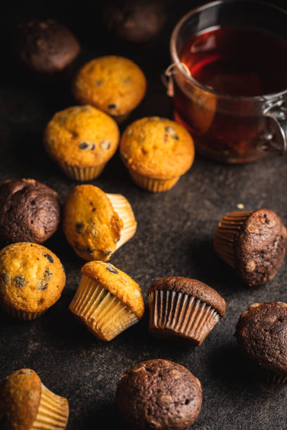 istock Chocolate and vanilla muffins. Sweet cupcakes. 1301457942