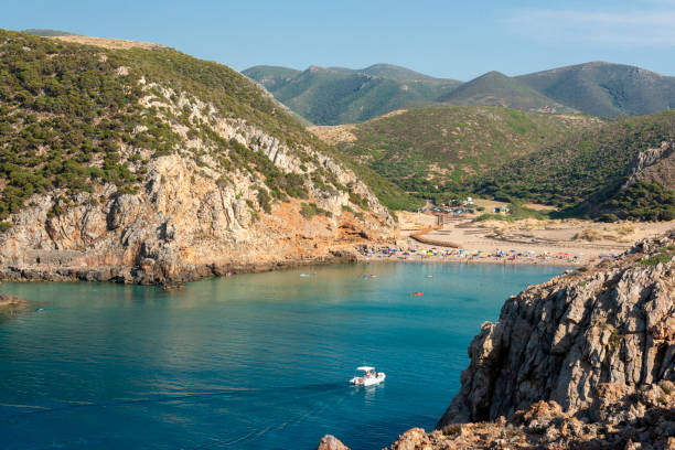 crystal clear and tropical water at Cala Domestica beach Beach of Cala Domestica from above, Iglesias, Sud Sardegna province, Sardinia, Italy, Mediterranean, Europe Buggerru stock pictures, royalty-free photos & images