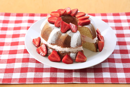 Strawberry vanilla pound cake with whipped cream.