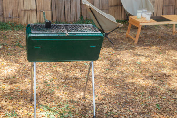 istock Outdoor portable barbeque grill at camping park. 1301460054