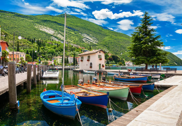 istock beautiful fishing harbor in Nago-Torbole 1301462231