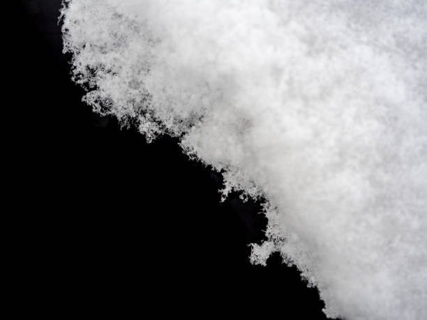 istock Snow cover on dark glass, abstract background 1301464240
