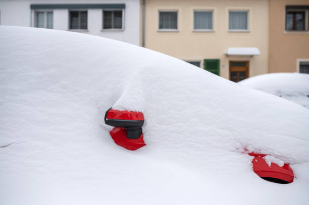 istock Car in winter covered with snow 1301466784
