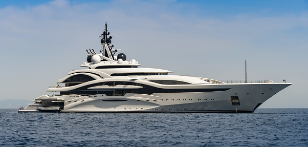 Amalfi Coast, Italy - August 2019: Luxury superyacht at anchor off the Amalfi Coast in Italy
