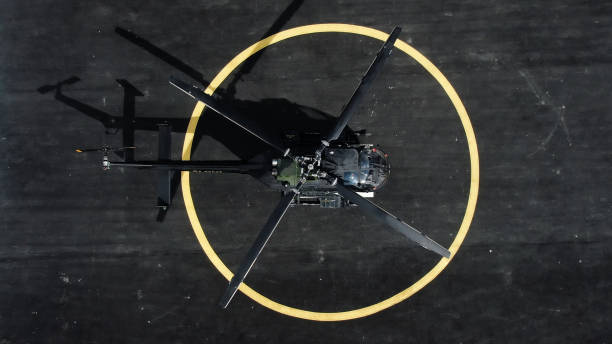istock Military helicopter at helipad. Directly above. 1301466913