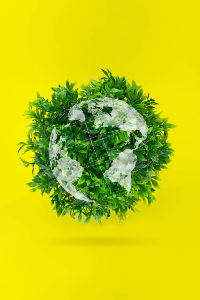 istock World environment day. Ecological Concept-A globe of Grass on a yellow background. Environmentally friendly planet. 1301472095