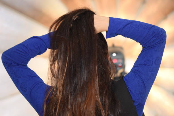 istock young woman with long hair 1301476952