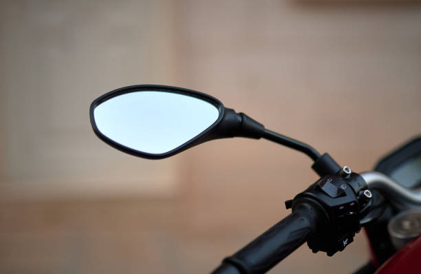 istock modern rear-view mirror of a red road motorcycle on a blurred background 1301477893