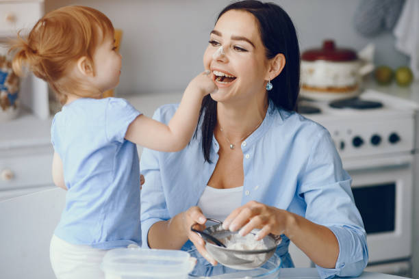 istock Cute family prepare the breakfest in a kitchen 1301487948