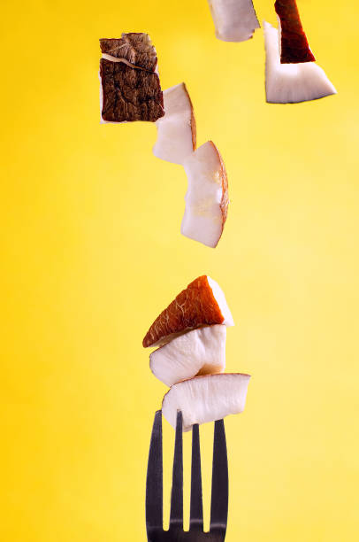 istock Coconut pieces on a fork and in the air 1301491639