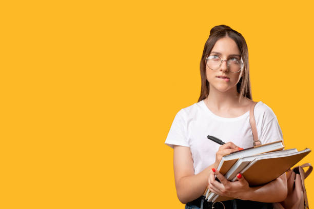 istock doubt face education courses puzzled woman 1301492609