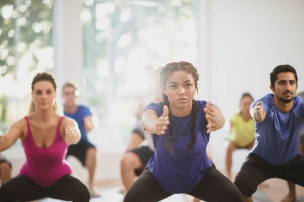 istock Multi ethnic group yoga fitness class 1301494208