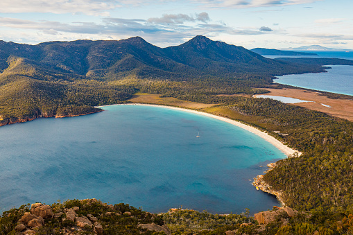 View of Wineglass bay beach from atop of mountain at sunrise, wineglass bay tasmania