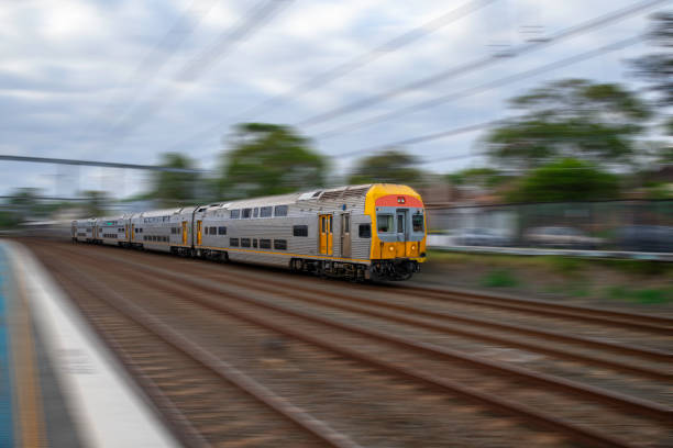 istock Commuter Train fast moving through a Station in Sydney NSW Australia 1301497823