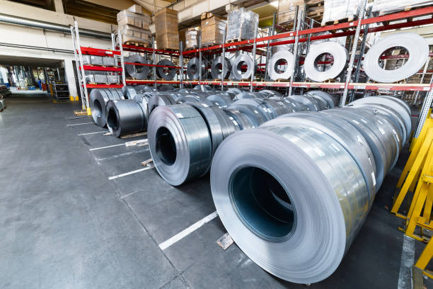 istock Tiered rack with sheet metal rolls. Internal warehouse of raw materials 1301503128