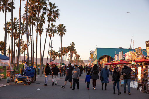 January 30, 2021, Venice, Los Angeles, California, USA: People walking in Venice beach, during COVID-19 pandemic, enjoying a sunny day.