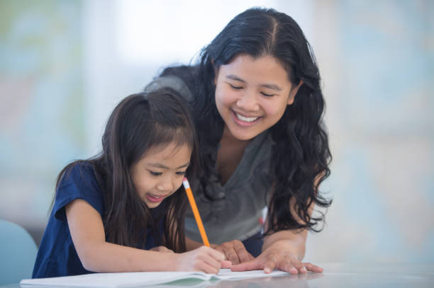 istock Thanks for helping me with my homework, mum! 1301504134