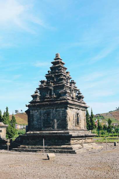 istock Local tourists visit Arjuna temple complex at Dieng Plateau. 1301504153