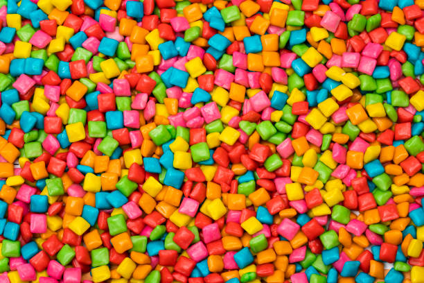 istock Background of colorful mini chewing gums - Text space 1301505107