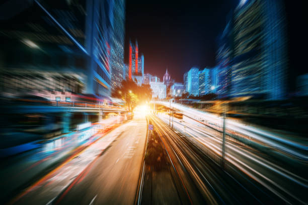 istock The light trails on the modern building background 1301507641