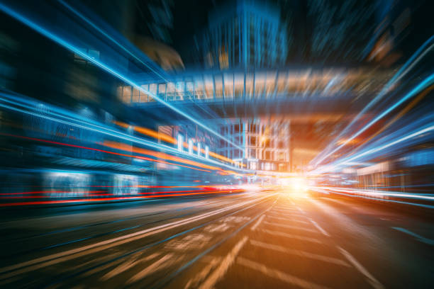 istock The light trails on the modern building background 1301507678