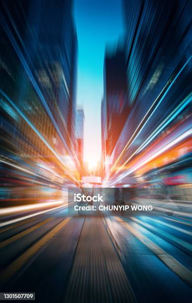 The Light Trails On The Modern Building Background Stock Photo - Download Image Now - Speed, Technology, Car