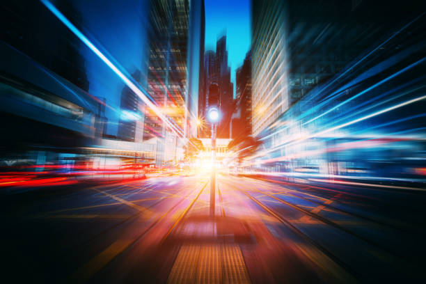 istock The light trails on the modern building background 1301507810