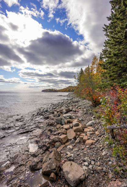 istock Rocky shore on Lake Superior with cloudy sky 1301510476