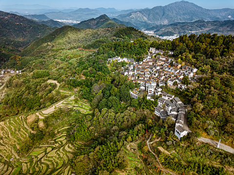 Landscape of mountain village and terraced fields in Wuyuan county, Jiangxi province, China.