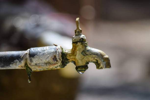 old tab close up pipe. ancient water drop leaking, plumber tool metal picture