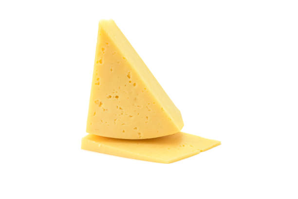 istock Solid yellow gouda cheese, close-up, isolated on a white background.selective focus. 1301515188
