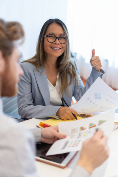istock Office employee having a meeting with their team 1301516405