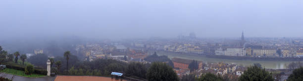 panoramic view of  florence city in the fog fine art - dramatic sky duomo santa maria del fiore piazzale michelangelo florence italy imagens e fotografias de stock
