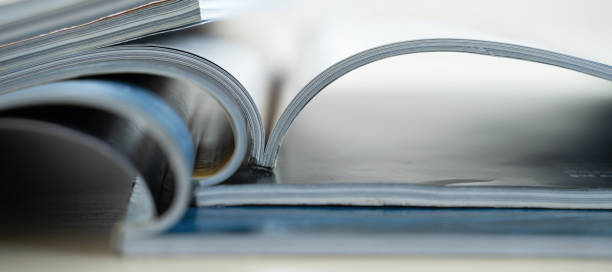 istock publication Newspaper and journal books background and catalog design article magazine press Newspaper with tablet 1301520519