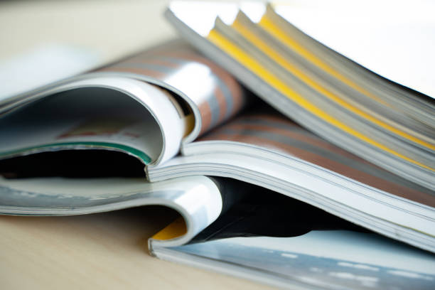 istock publication Newspaper and journal books background and catalog design article magazine press Newspaper with tablet 1301520553