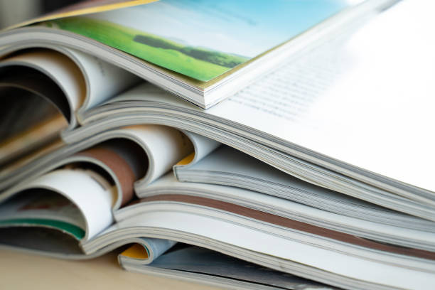 istock publication Newspaper and journal books background and catalog design article magazine press Newspaper with tablet 1301520557