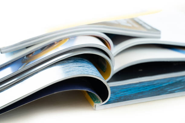 istock publication Newspaper and journal books background and catalog design article magazine press Newspaper with tablet 1301520566