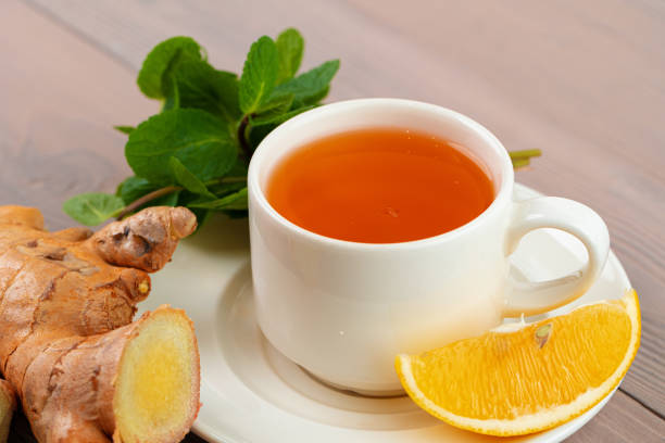 istock Cup of tea served with lemon and mint 1301530504