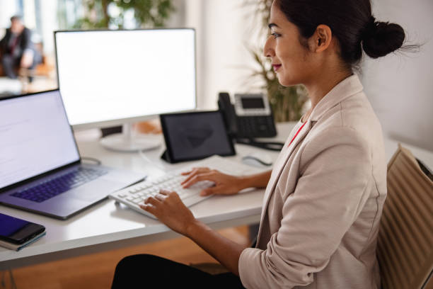 istock Indian Businesswoman Working In The Office And Using Computer 1301531972