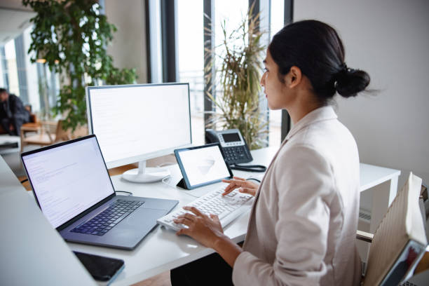 istock Indian Businesswoman Working In The Office And Using Computer 1301531980